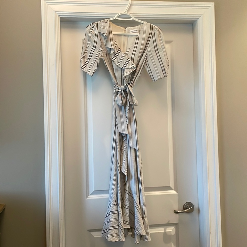 Pretty Calvin Kline dress with tie up belt to be worn loose or tight worn once